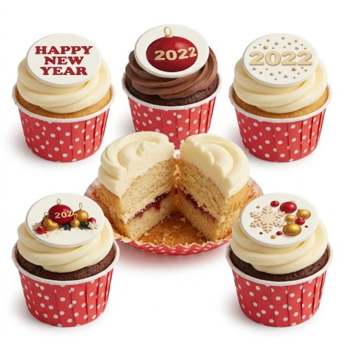 New Year cupcakes with 'Happy New Year' and '2022' toppers, baubles, and snowflakes.