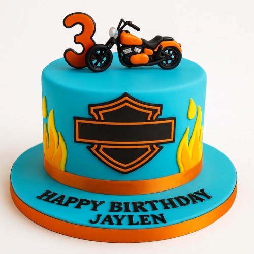 Blue single-tier birthday cake with orange motorcycle topper, custom age number, flame decorations, and a biker shield emblem.