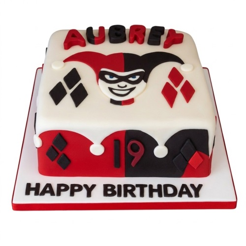 Square Harley Quinn themed birthday cake with red, black, and white fondant, featuring jester hat design and diamond patterns.