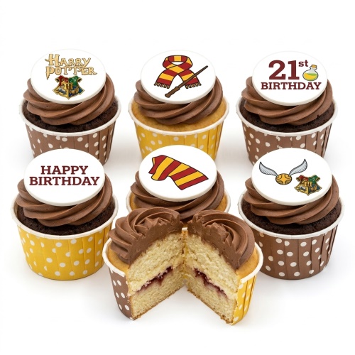 Harry Potter themed cupcakes with Hogwarts crest, Golden Snitch, scarf, wand, and custom age toppers.