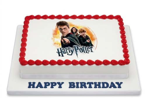 Rectangular white Harry Potter birthday cake with red piping and 'Happy Birthday' message on the board.