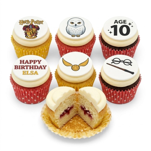 Harry Potter themed cupcakes with Gryffindor crest, Hedwig, Golden Snitch, glasses, and wand toppers.