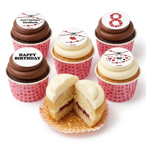 Cupcakes with heart and bow toppers, some with 'Happy Birthday' message and a number '8' made of hearts.
