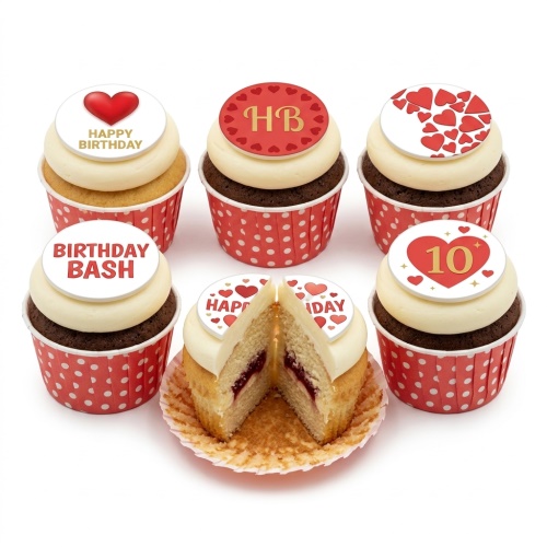 Six birthday cupcakes with red and white heart toppers, some with 'Happy Birthday' and a custom age '10'.