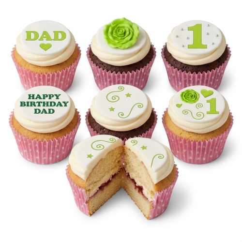 Assortment of vanilla and chocolate cupcakes with white frosting, green rose, heart, swirls, and custom age/message toppers.