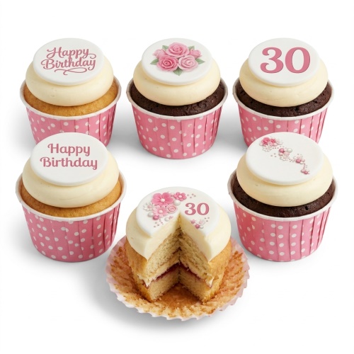 Set of pink floral birthday cupcakes with custom age topper and 'Happy Birthday' messages in pink polka dot cases.