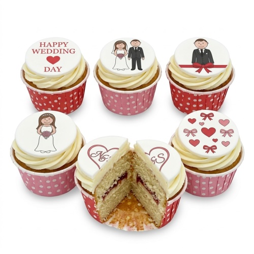 Wedding cupcakes with bride and groom toppers, hearts, bows, and personalised initials N and S.