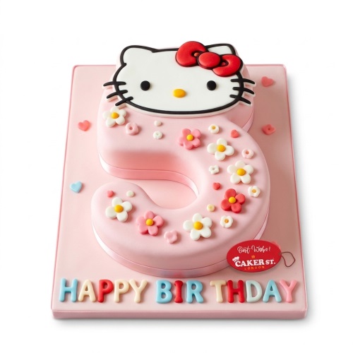 Pink number shaped cake with Hello Kitty face and fondant flowers for a birthday.