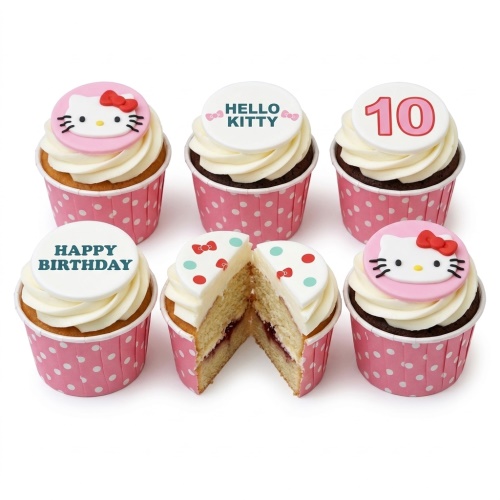 Hello Kitty themed cupcakes with pink bows, polka dot cases, and custom age topper.