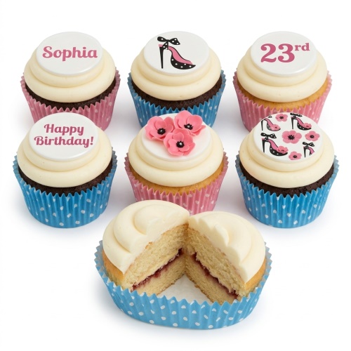 Cupcakes with cream frosting, pink high heel and floral toppers, and custom age/name options.