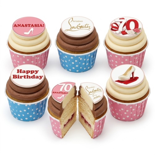 Collection of high heel birthday cupcakes with designer shoe and custom age toppers in pink and blue cases.