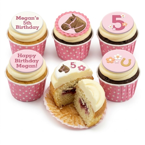 Horse themed birthday cupcakes with custom age toppers, horseshoes, and flowers in pink wrappers.