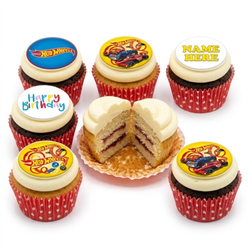 Hot Wheels themed cupcakes with logo and race car toppers, some with 'Happy Birthday' and 'NAME HERE' messages, in red polka dot cases.