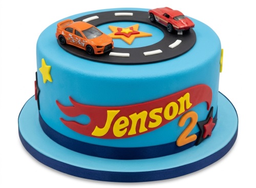 Blue fondant cake with toy racing cars, road, stars, and personalised name banner.