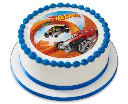 Round white Hot Wheels birthday cake with blue piping and ribbon, featuring an edible image of racing cars.