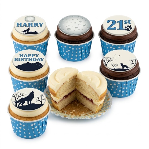 Cupcakes with howling wolf and moon toppers in blue polka dot cases, some with vanilla, some with chocolate.