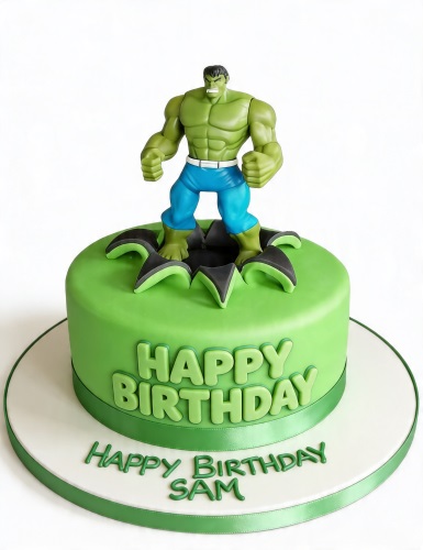 Green single-tier Hulk birthday cake with a Hulk figurine topper and 'Happy Birthday' message.