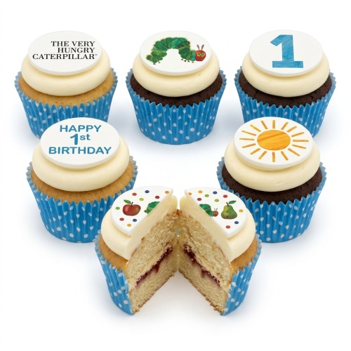Cupcakes with The Very Hungry Caterpillar theme, sun, and "Happy 1st Birthday" toppers in blue wrappers.