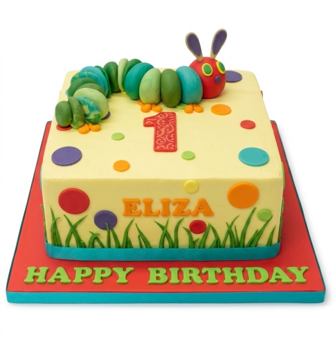 Vibrant yellow square cake with a green and blue Very Hungry Caterpillar, colourful polka dots, and green grass border.