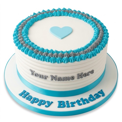 White round birthday cake with blue and grey piping, a light blue heart, and space for a custom name.