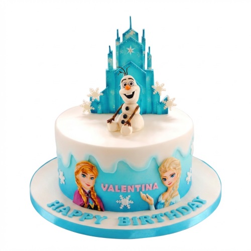 Round white and blue Frozen themed birthday cake with Olaf, Elsa, Anna, and an ice castle.