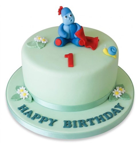 In The Night Garden Igglepiggle 1st birthday cake with number one topper and daisies.
