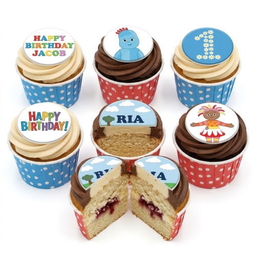 Selection of In the Night Garden themed cupcakes with character toppers, a number one, and custom name/message toppers, in blue and red polka dot cases.
