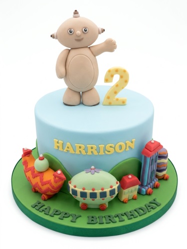 Iggle Piggle birthday cake with character figure and custom age topper.
