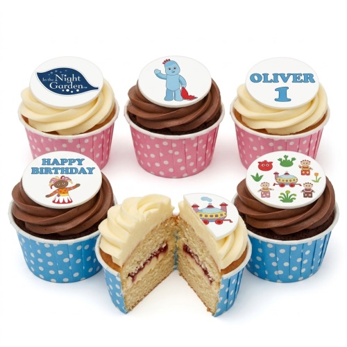 In the Night Garden themed cupcakes with Igglepiggle, Upsy Daisy, and Ninky Nonk toppers, in pink and blue polka dot cases.