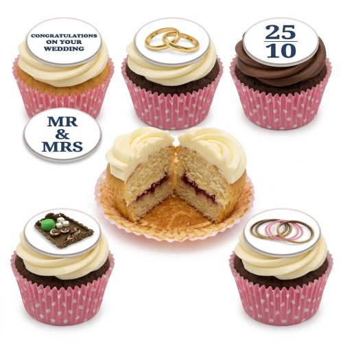 Vanilla and chocolate cupcakes with white frosting, decorated with wedding rings, 'Mr & Mrs', 'Congratulations on your Wedding', '25/10', and sweet tray toppers.