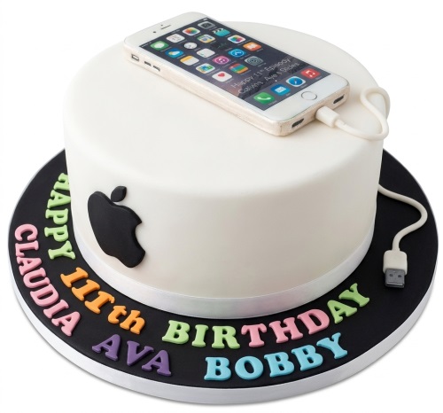 White round birthday cake with an edible iPhone and black Apple logo.