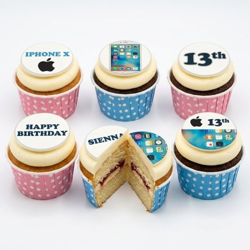Cupcakes with iPhone, Apple logo, and app screen edible toppers in pink and blue polka dot cases.