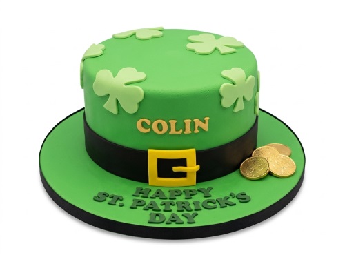 Green leprechaun hat cake with shamrocks, gold buckle, and chocolate coins, with a personalised name.