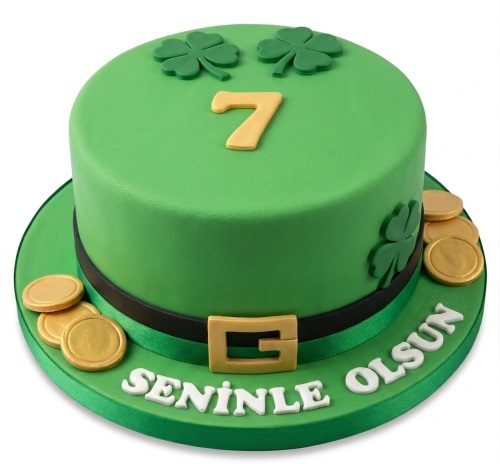 Green leprechaun hat birthday cake with shamrocks, gold coins, and custom age topper.