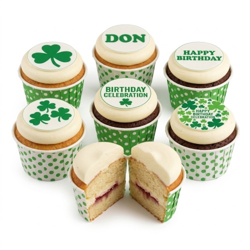 Green shamrock birthday cupcakes with custom name and message toppers.