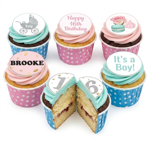 Round pastel pink cupcakes with mint green drip, gold accents, macarons, pink roses, and a silver glitter 'It's a Boy' baby pram topper.