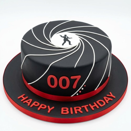 Round black 007 James Bond theme birthday cake with red and white details, featuring gun barrel swirl and 'Happy Birthday' message.