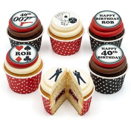 Cupcakes with 007 gun logo, playing cards, dice, and spy silhouettes, with red and black polka dot cases.