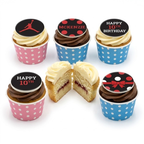 Kids birthday cupcakes with vanilla and chocolate frosting, featuring sports, polka dot, bow, and custom age toppers in pink and blue wrappers.