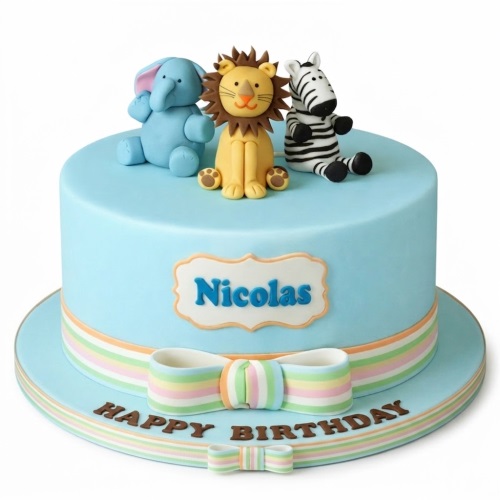 Light blue single-tier cake with 3D elephant, lion, and zebra animal figurines on top, with pastel striped ribbon and a custom name plaque.