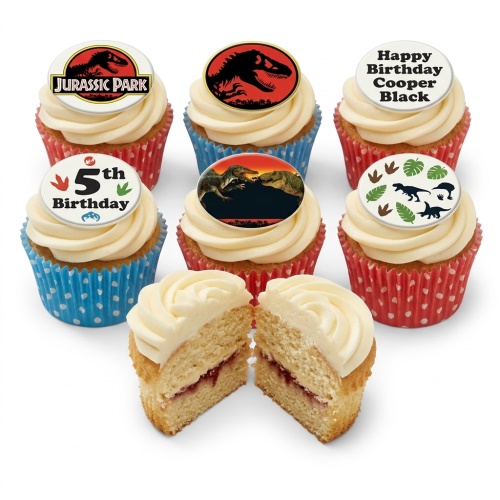 Jurassic Park themed cupcakes with dinosaur toppers, vanilla icing, and red and blue cases.