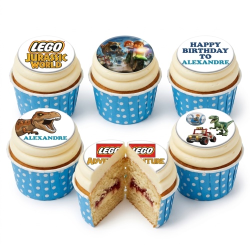 LEGO Jurassic World themed cupcakes with dinosaur and adventure designs in blue polka dot cases.