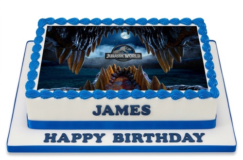 Two-tiered white cake with blue trim, featuring a Jurassic World dinosaur edible image on top.