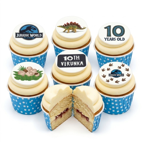 Jurassic World themed cupcakes with dinosaur eggs, Stegosaurus, and custom age toppers.