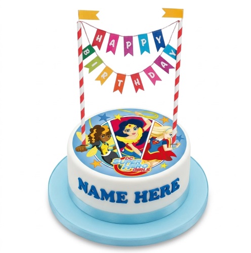 Round white birthday cake with DC Super Hero Girls edible topper and "Happy Birthday" banner.