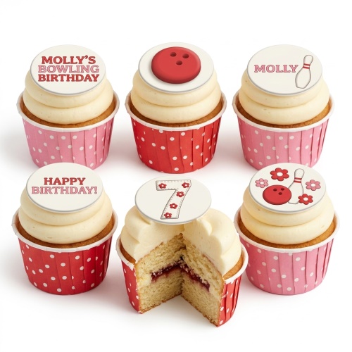Six vanilla cupcakes with cream frosting, red and pink polka dot cases, and bowling theme toppers including a custom age.