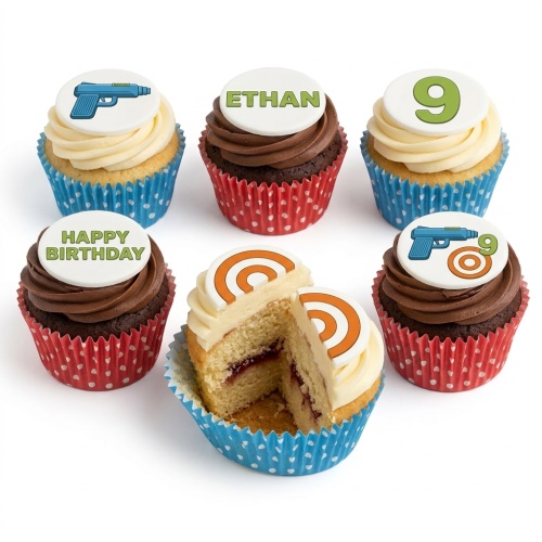 A set of gaming-themed birthday cupcakes with a toy gun, target, and custom age and name toppers.