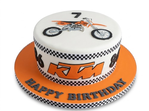 White and orange round KTM motocross birthday cake with a number 7 topper and checkered flag border.