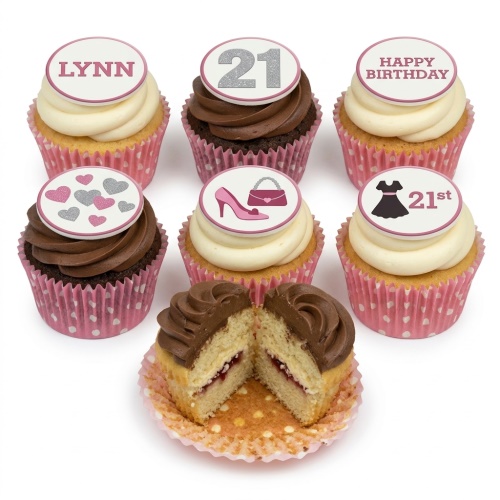 Selection of vanilla and chocolate cupcakes with pink and silver fashion-themed toppers, including high heel, handbag, hearts, and custom age '21' and '21st' designs.