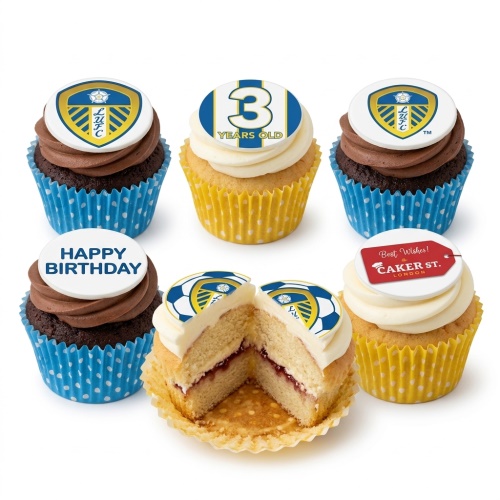 A set of Leeds United football themed birthday cupcakes with club crests, a custom age '3 YEARS OLD' topper, and 'HAPPY BIRTHDAY' message.